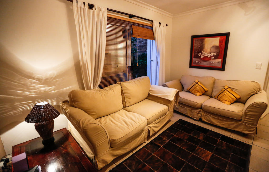 Secret Garden Guesthouse Bloubergstrand Quarto foto